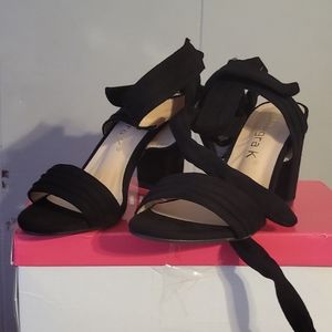 Black size 5 tie up heels